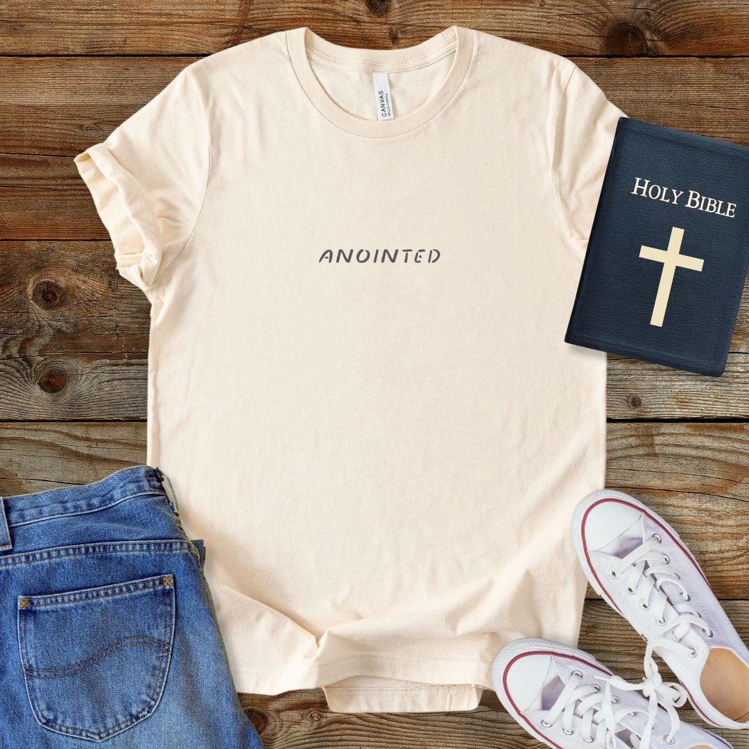 a t - shirt that reads, holy bible, and a pair of jeans