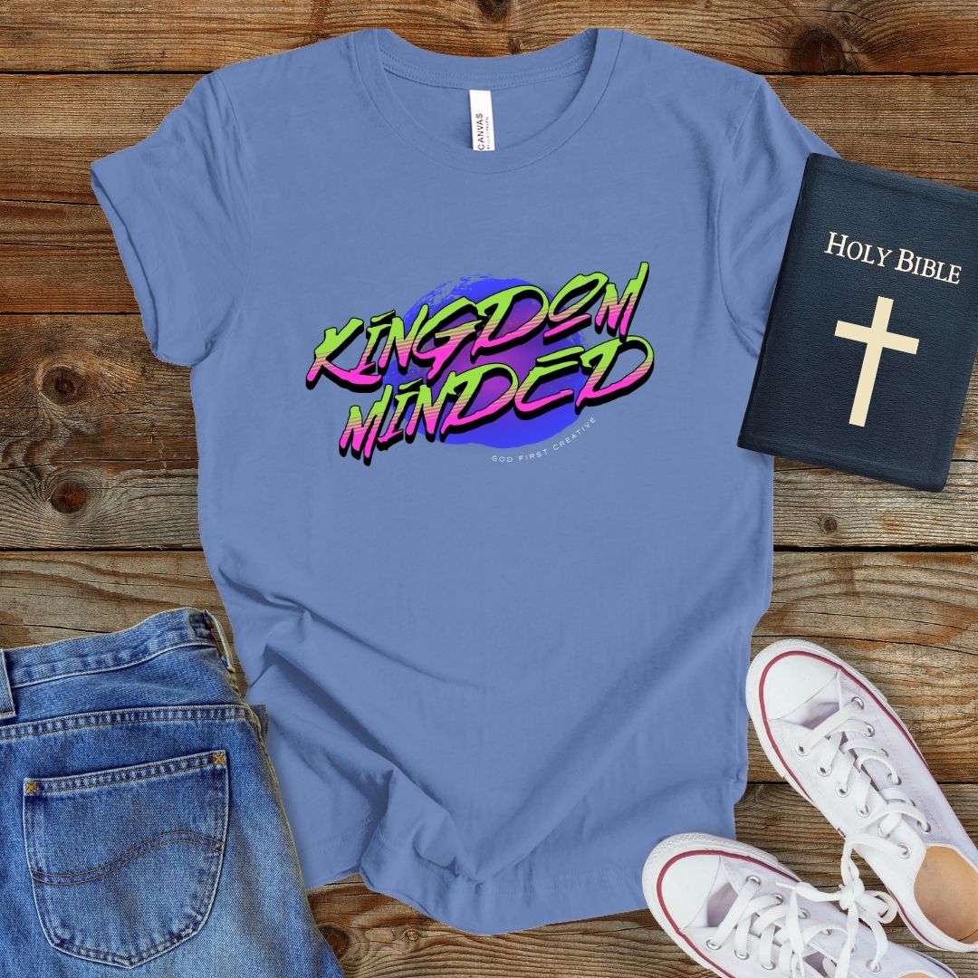 a blue t - shirt with the words kingdom minds on it