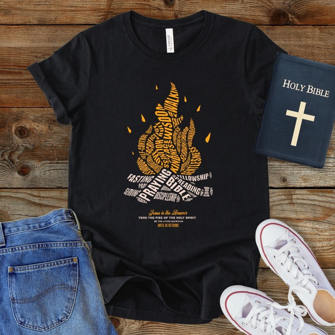 a black t - shirt with a picture of a campfire on it