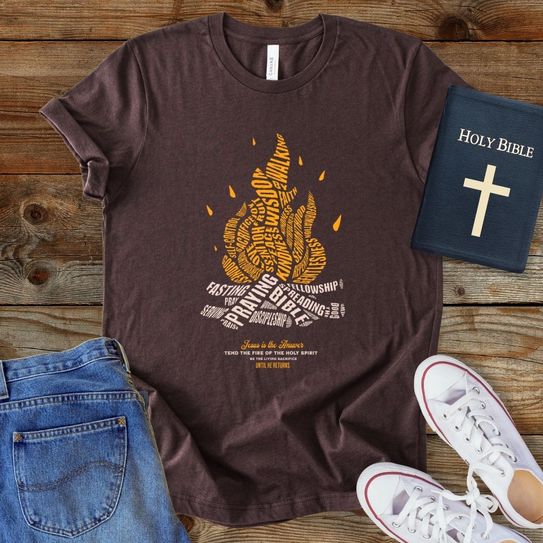 a t - shirt with a bible next to it