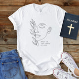 a t - shirt with a picture of a woman's face on it