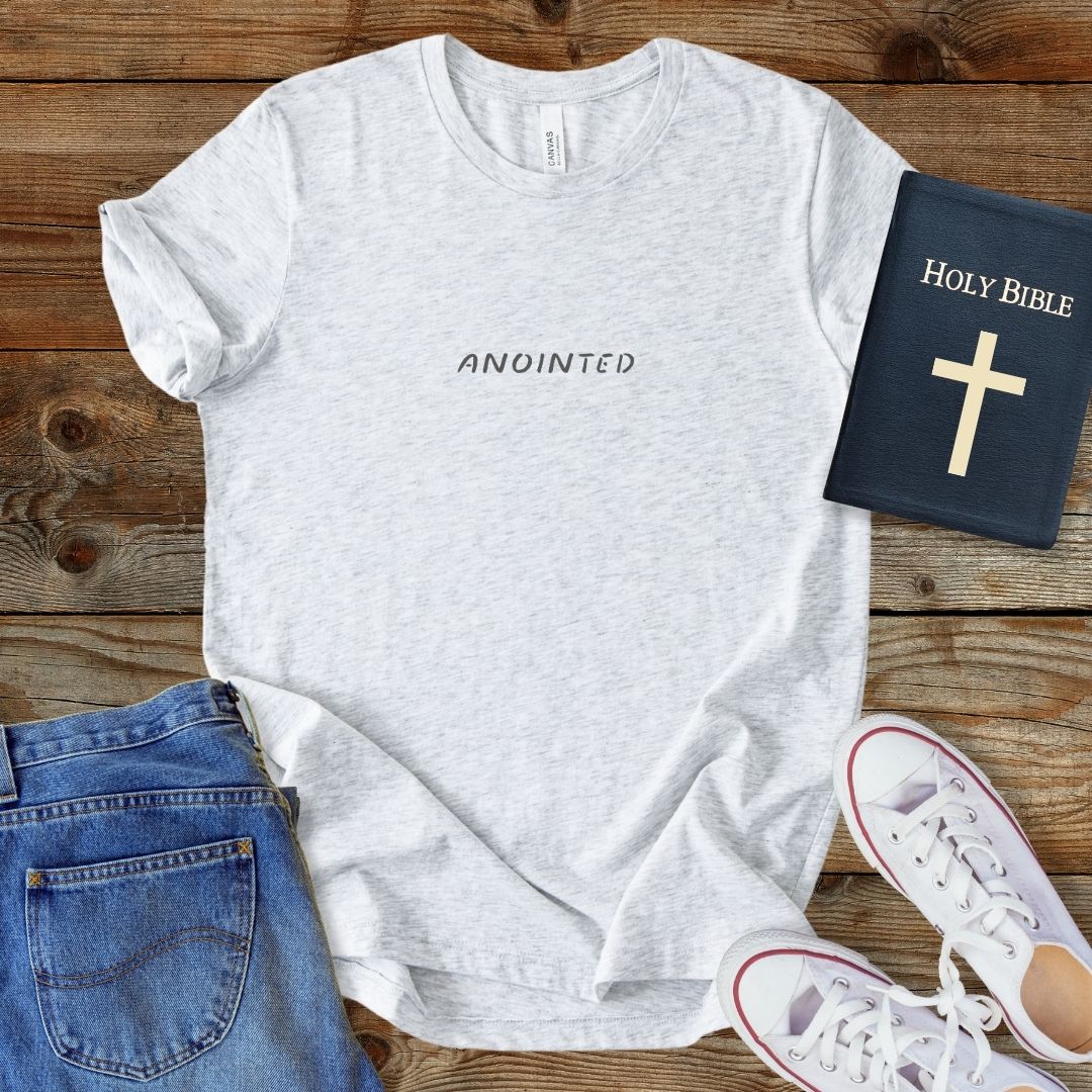 a t - shirt with the words, holy bible and a book