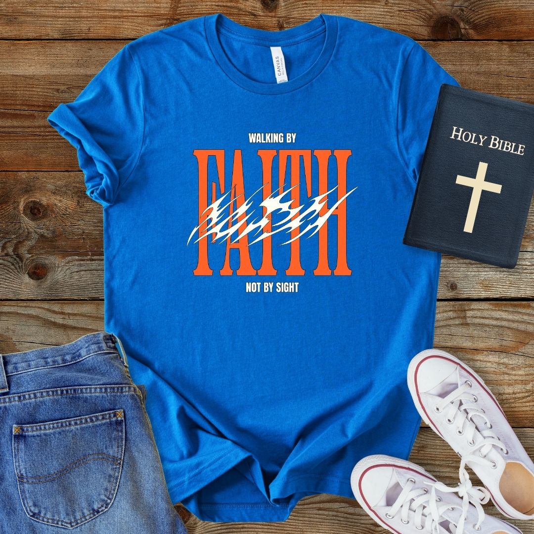 a blue t - shirt with an orange and white graphic on it