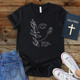 a t - shirt with a picture of a woman's face on it