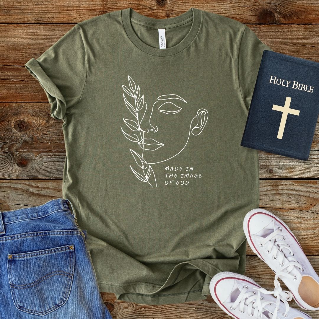 a t - shirt with a picture of a woman's face next to a