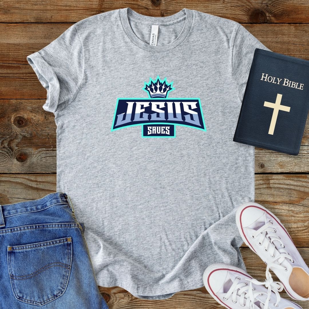 a t - shirt with the word jesus on it next to a pair of jeans