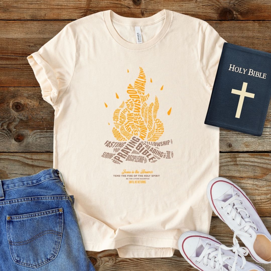 a t - shirt with a bible next to it