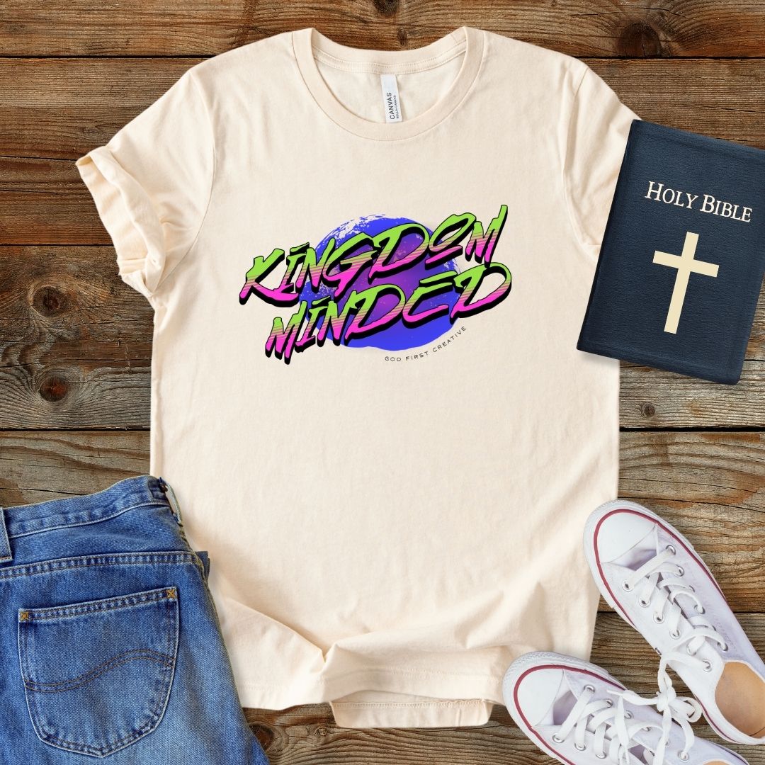 a t - shirt with the word gang bang on it next to a pair of