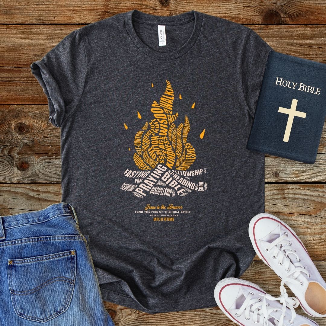 a t - shirt with a bible next to it