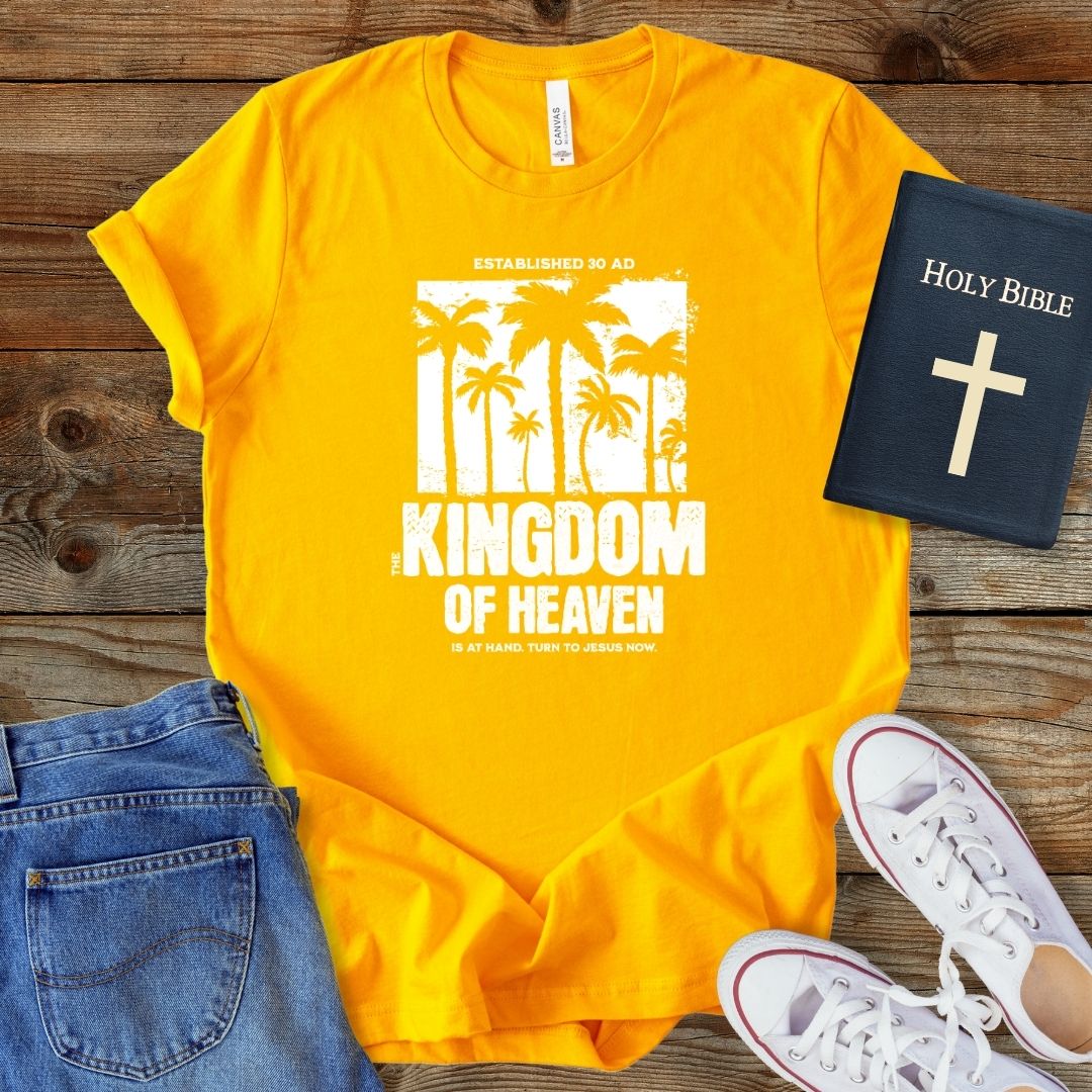 a yellow t - shirt with the words kingdom of heaven on it