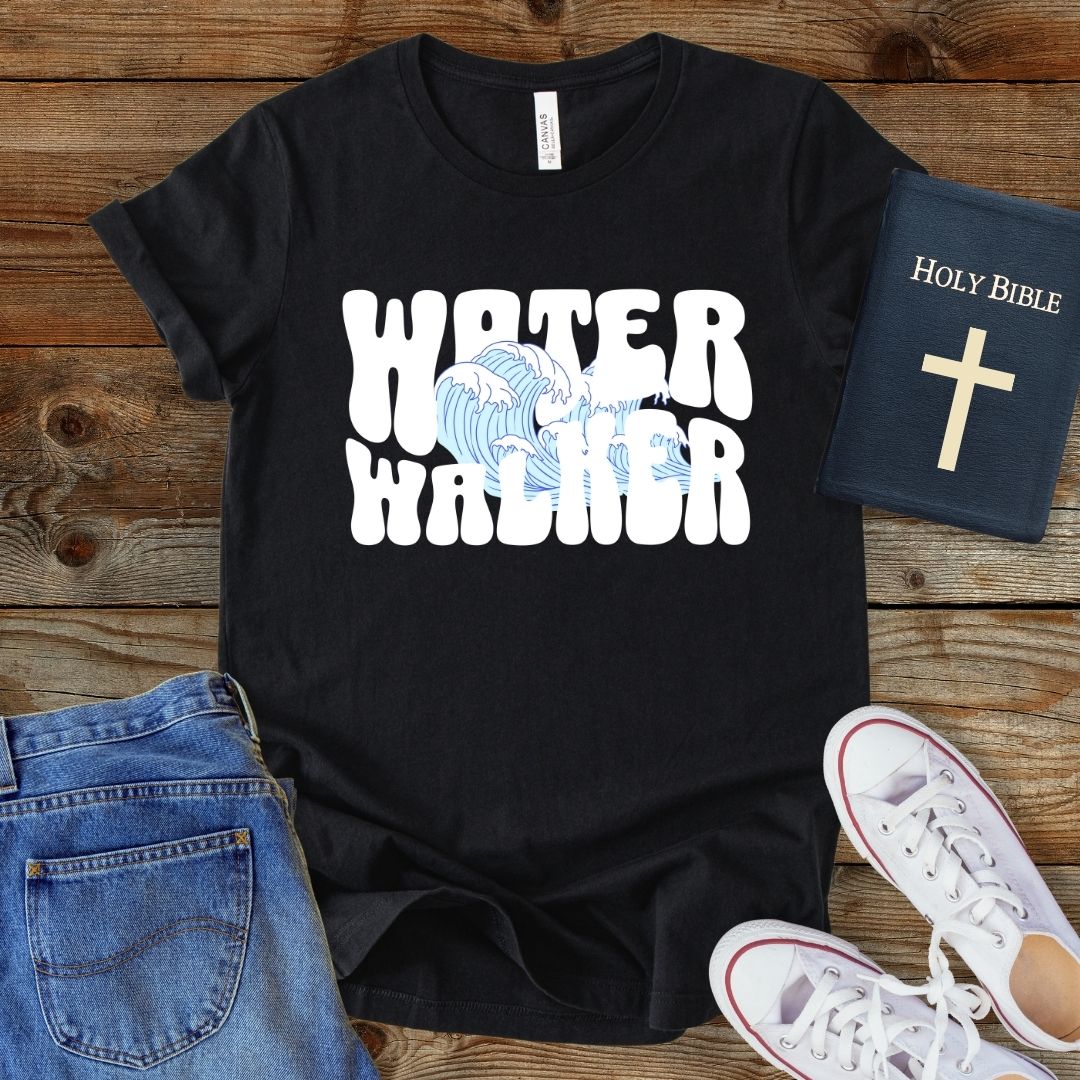 a t - shirt that says water warrior next to a pair of jeans and a