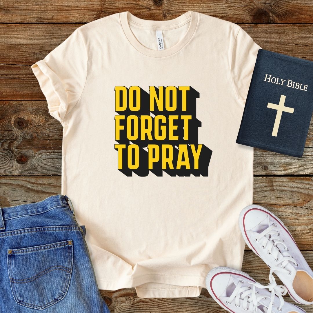 a t - shirt that says do not forget to pray