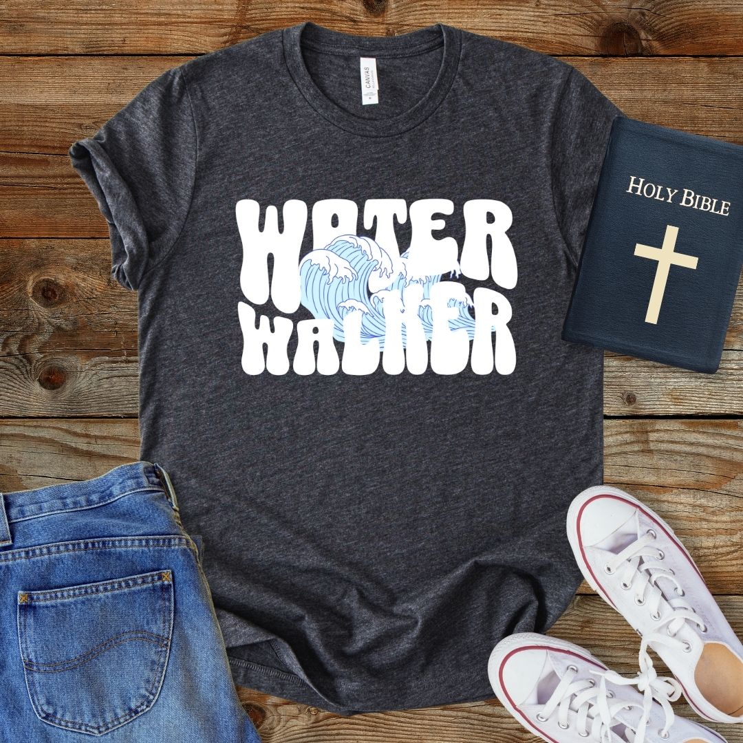 a t - shirt that says water warrior next to a bible