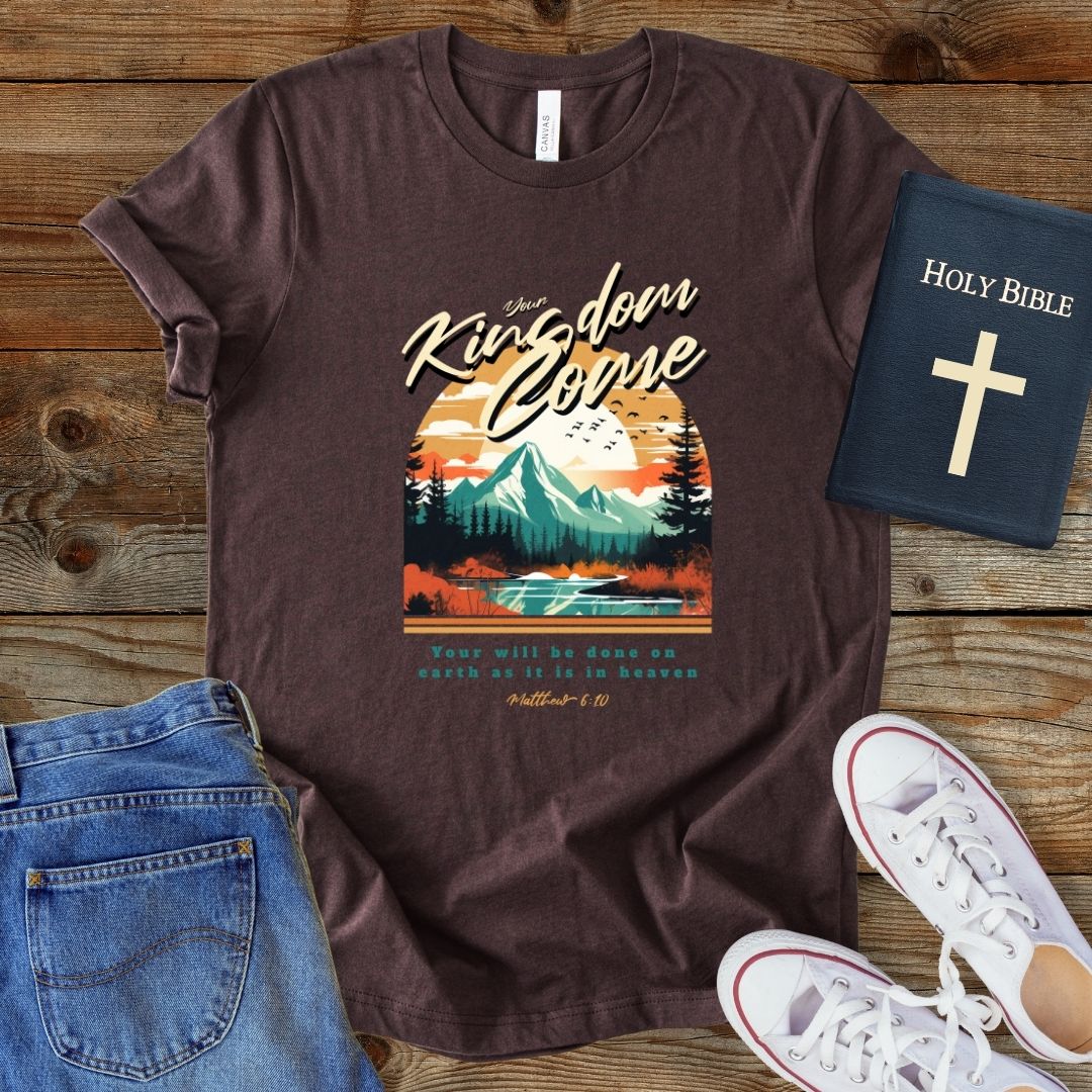 a t - shirt with a mountain scene on it
