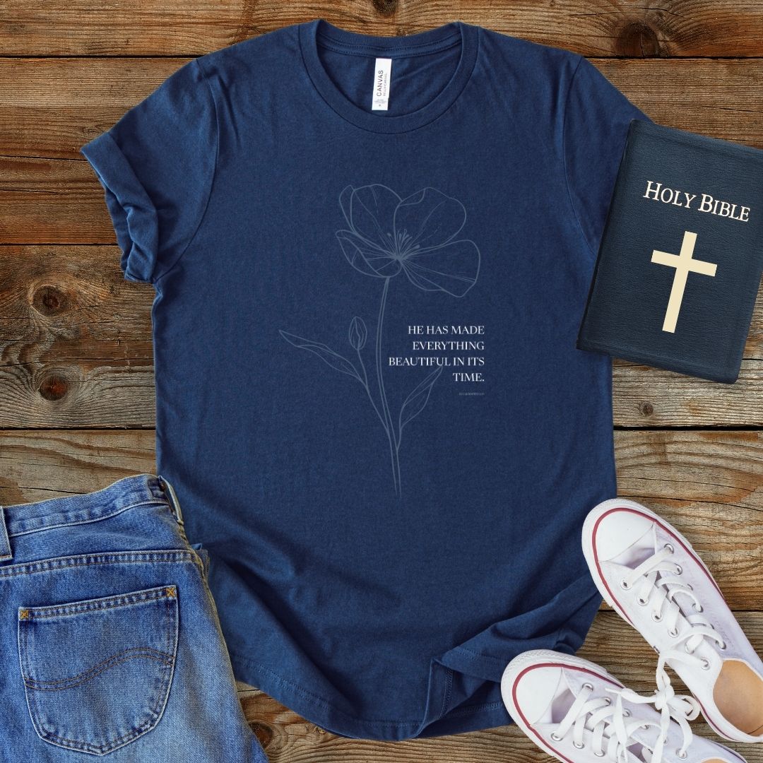 a t - shirt with a bible and a pair of jeans